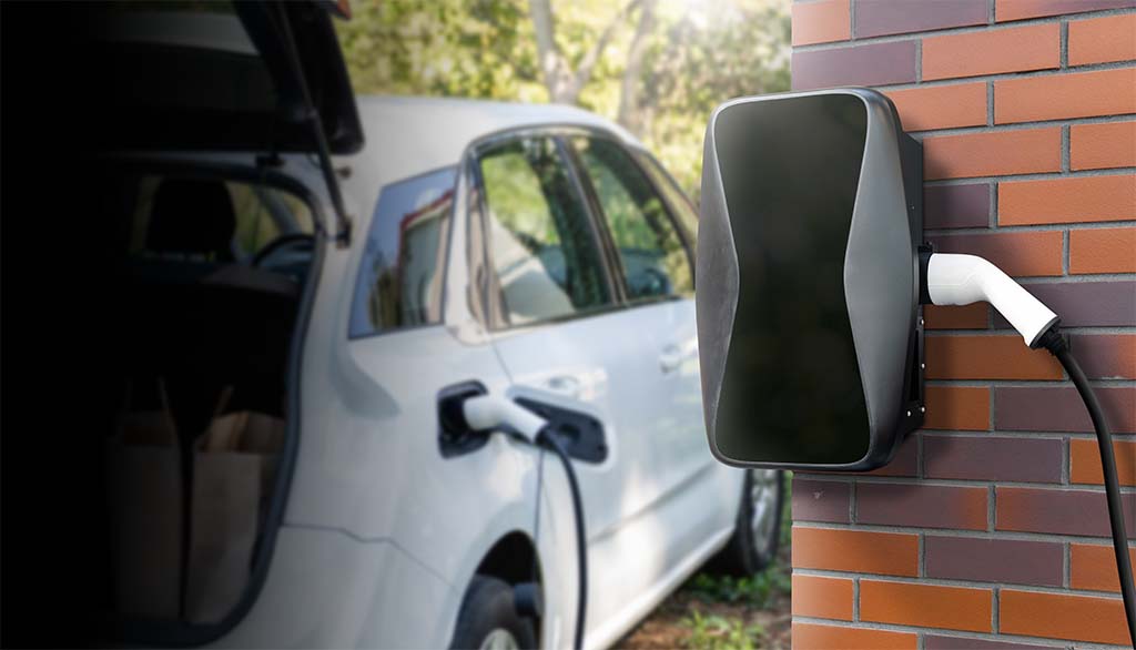 Get a quote now! - GoPower Group Plug-in EV charger connected to a 240V outlet, offering flexible and portable charging options up to 40 amps.